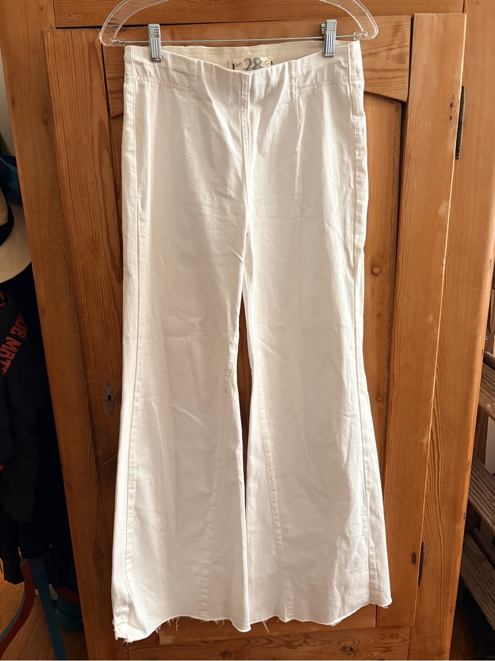We the Free Sz 28 white pull on flare high rise jeans